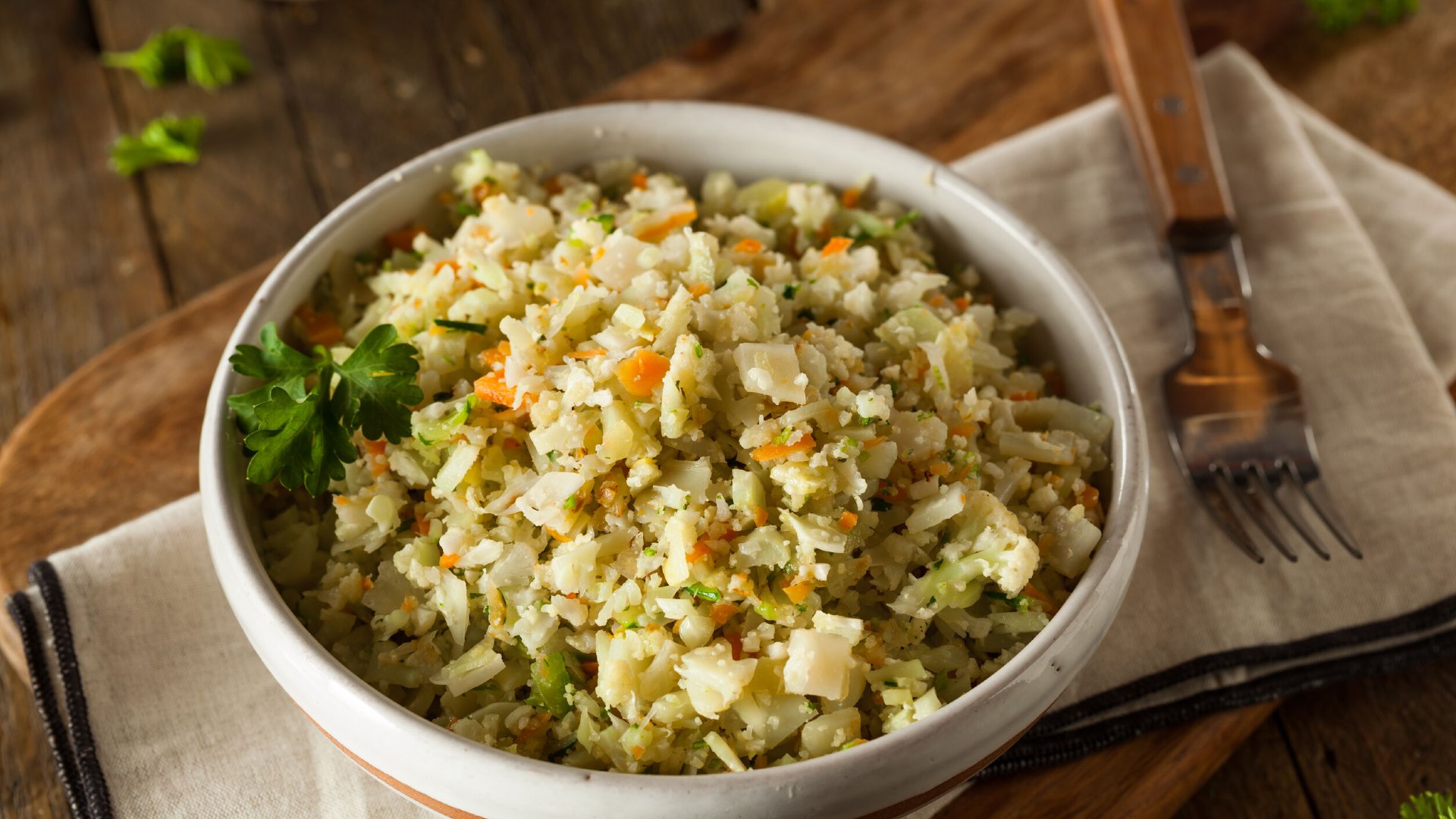 Try swapping white rice for cauliflower rice (shown here) or brown rice.