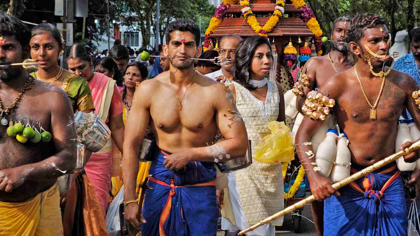 Thaipusam, a Hindu festival, usually highlighted by a spectacular, colourful procession of kavadi-carrying devotees.