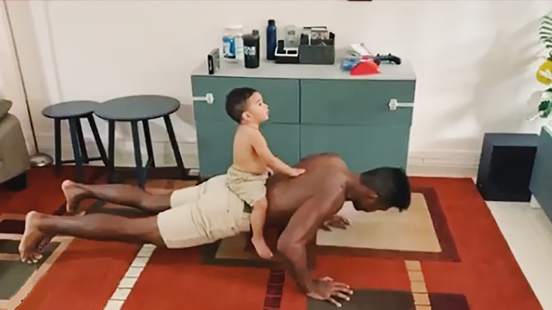 Struggling to workout with a toddler at home? Try these fun, kid-friendly exercises from MMA fighter Amir Khan to build strength while bonding.