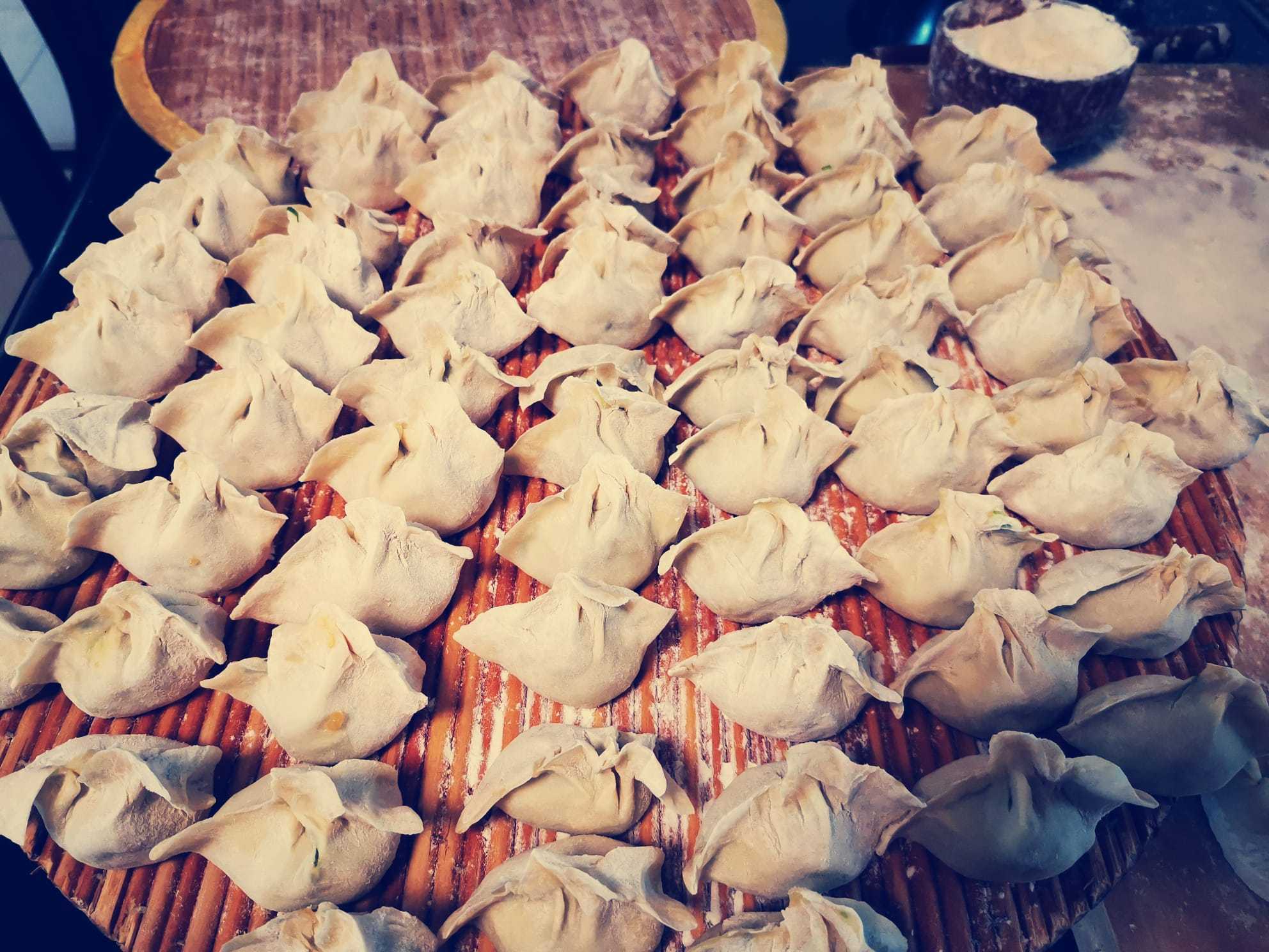 Make dumplings out of dough with Anan Christie Make dumplings out of dough with Anan Christie.