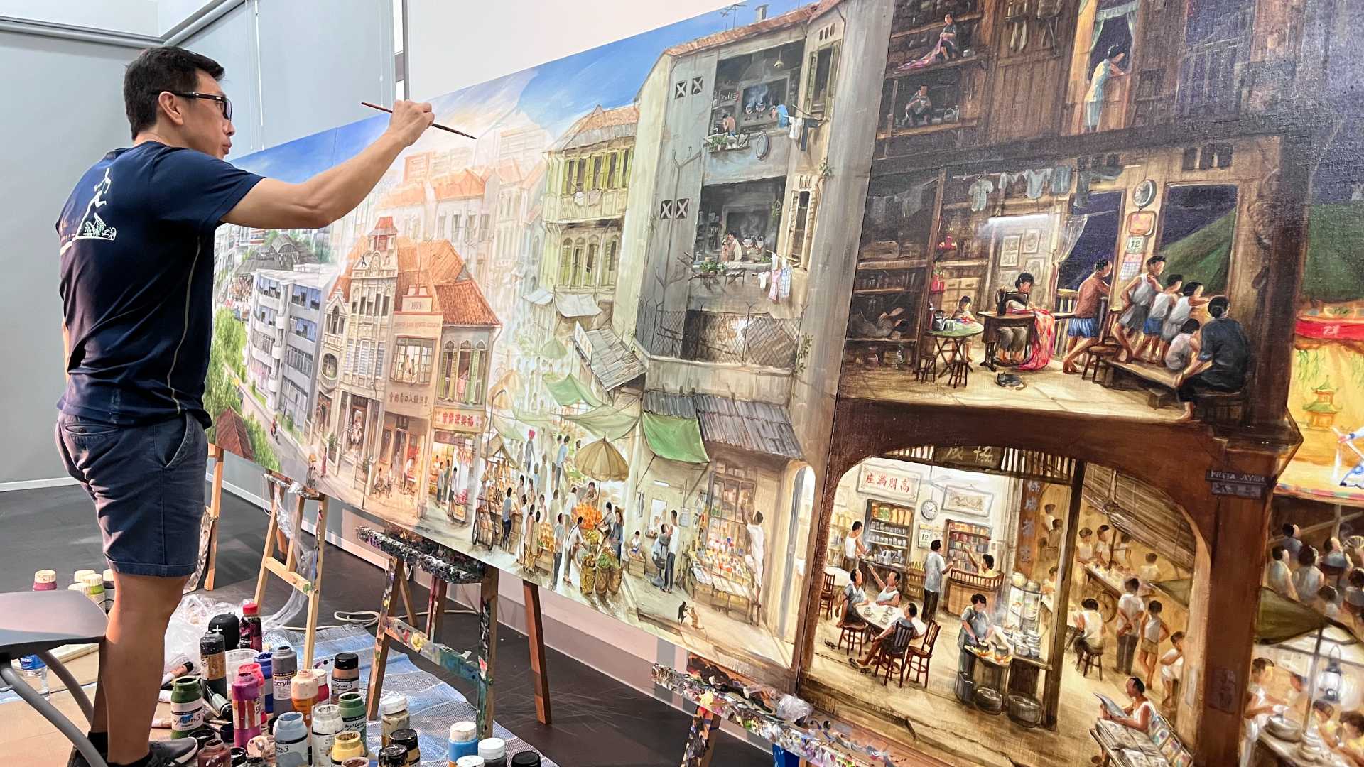 The public were invited by artist Yip Yew Chong to witness him putting the finishing touches at Tiong Bahru Community Centre.