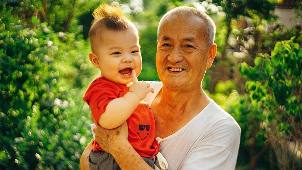 Asian grandparent with grandchild