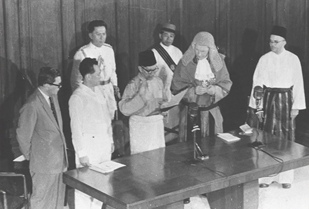 Swearing in of Singapore's first Head of State Yusof bin Ishak at Former City Hall Chamber, part of National Gallery today