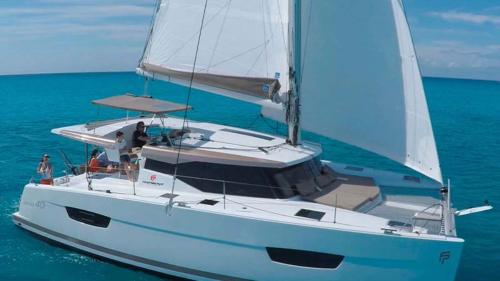 Singapore Yacht Charter's Aquaholic yacht is an elegant Fountaine Pajot Lucia 40 sailing catamaran.