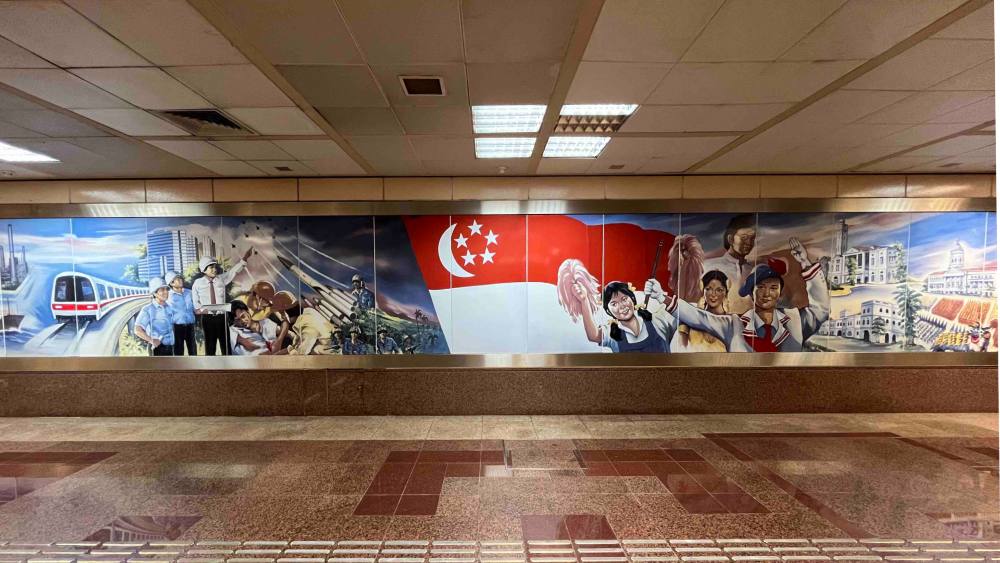 "Pageant of Singapore's History" by Than Kiang How & Lim Sew Yong at Raffles Place MRT station shows how Singapore grew from humble beginnings.