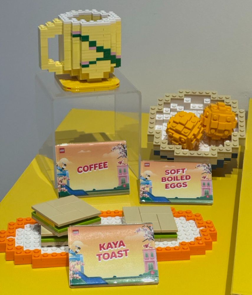 LEGO model of a traditional Singaporean breakfast, including Coffee (Kopi), Soft Boiled Eggs, and Kaya Toast.