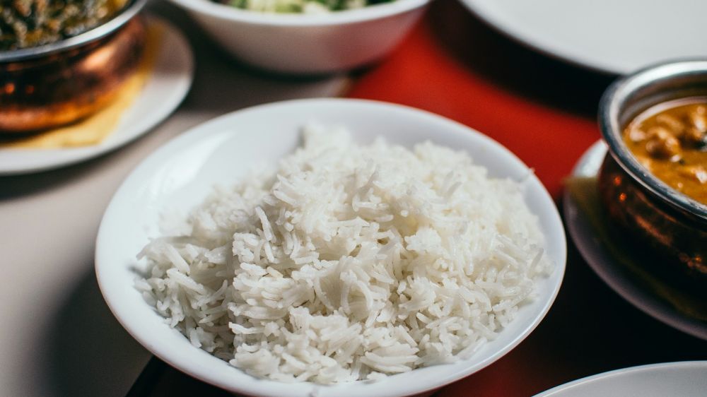 Turn your leftover rice into budget-friendly treats, from rice fritters to cheesy rice balls and more.