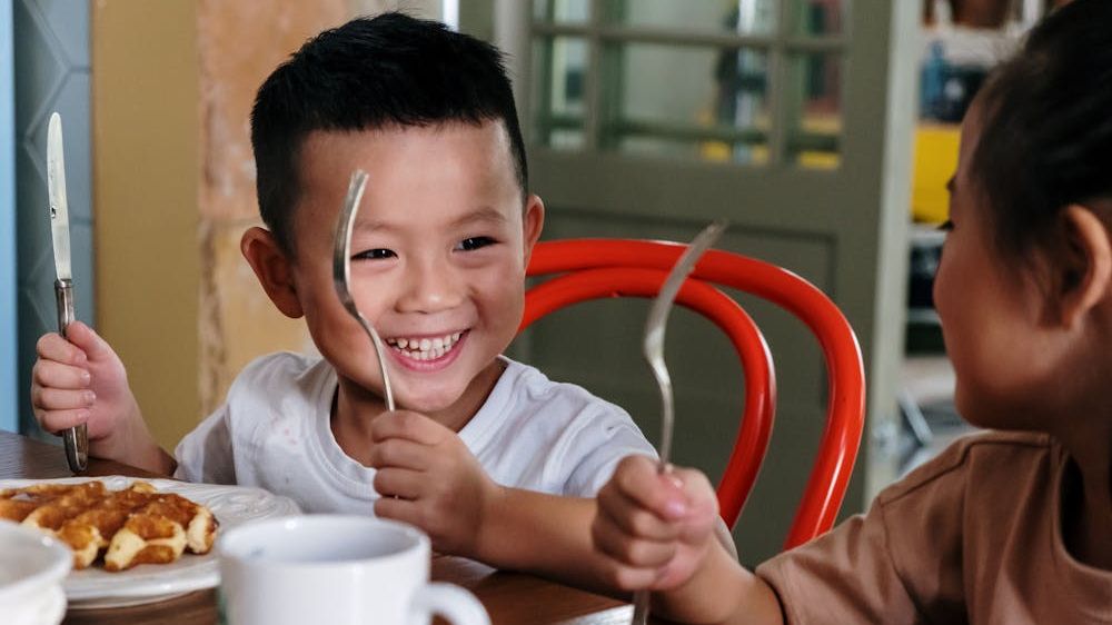 Explore practical strategies for creating memorable, device-free mealtime moments with your children in a tech-obsessed world.