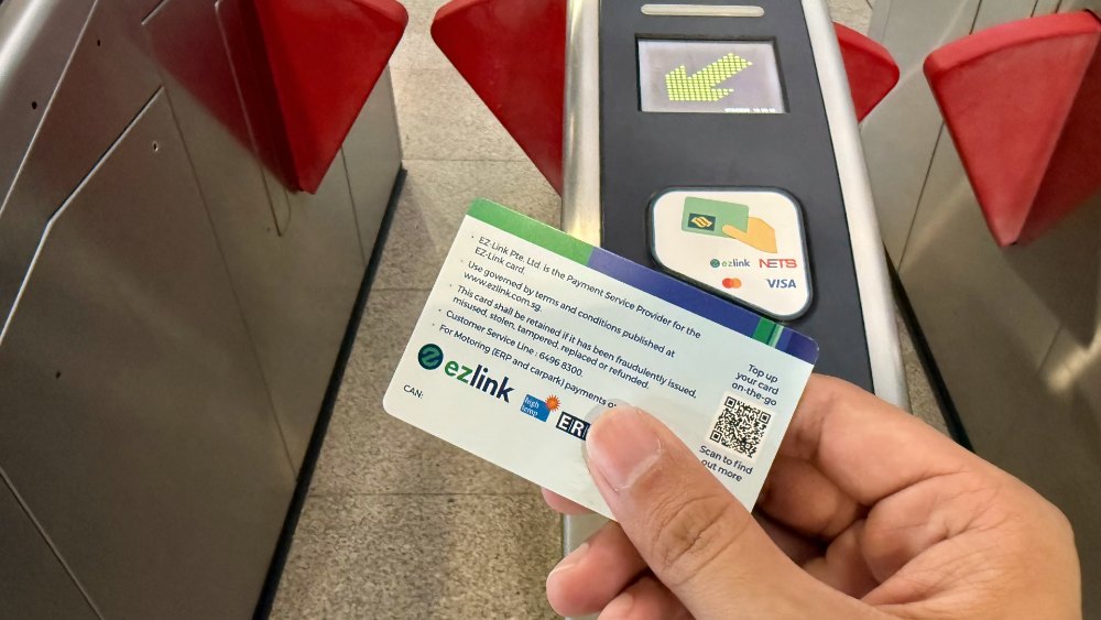 EZ-link card at Singapore's MRT station gantry.