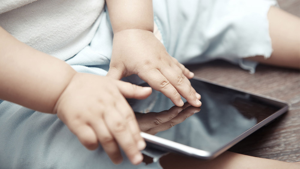 Why you shouldn't beat yourself up for offering your kid a screen every now and then.
